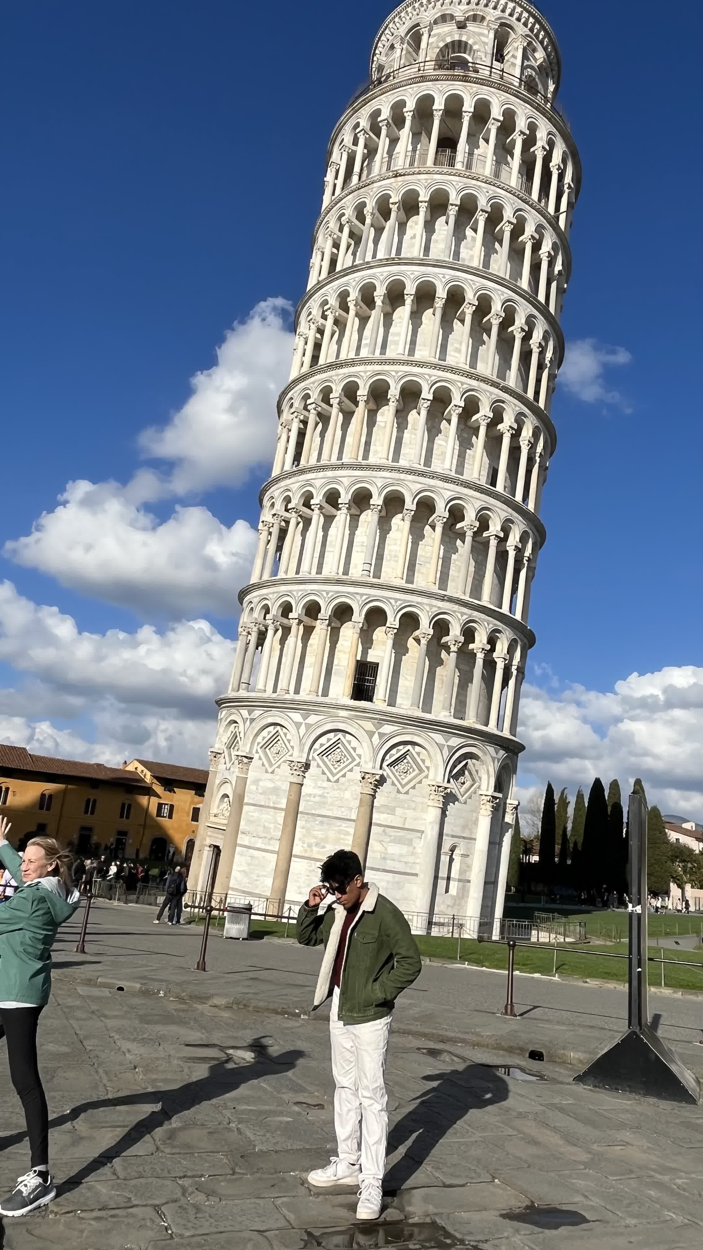 Standing in front of the Leaning Tower of Pisa