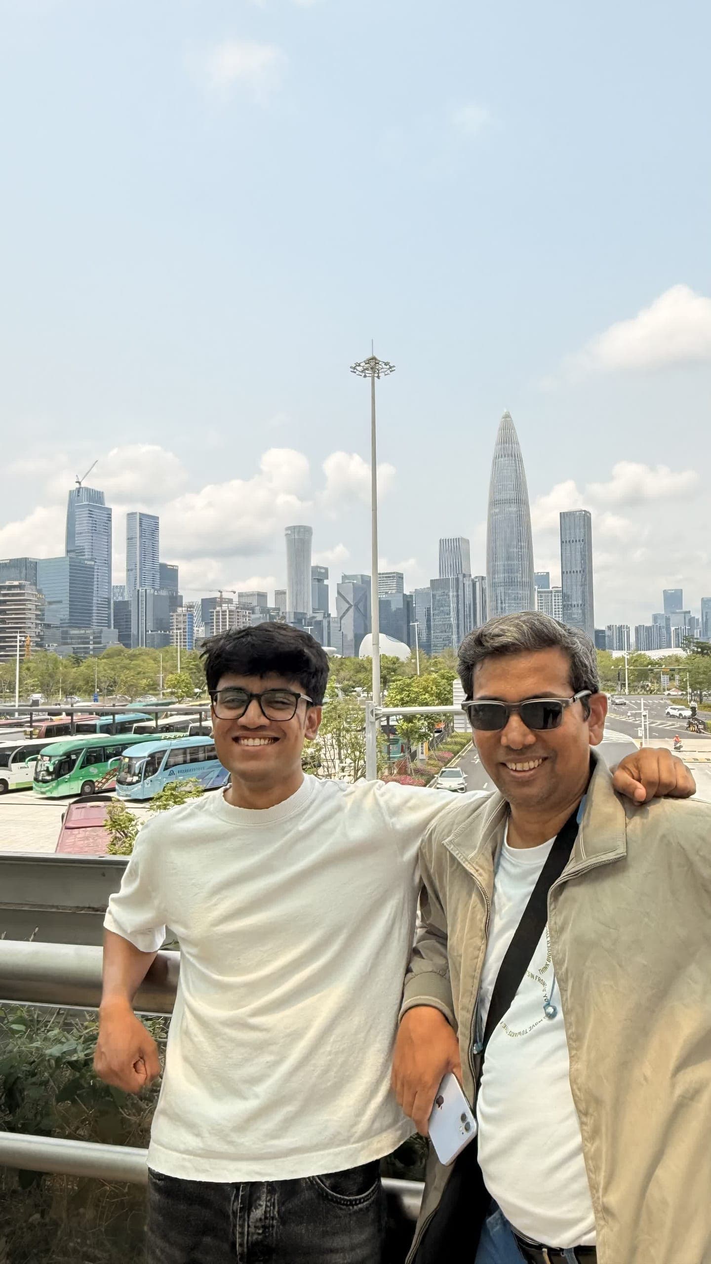 With a friend in front of the Shenzhen skyline