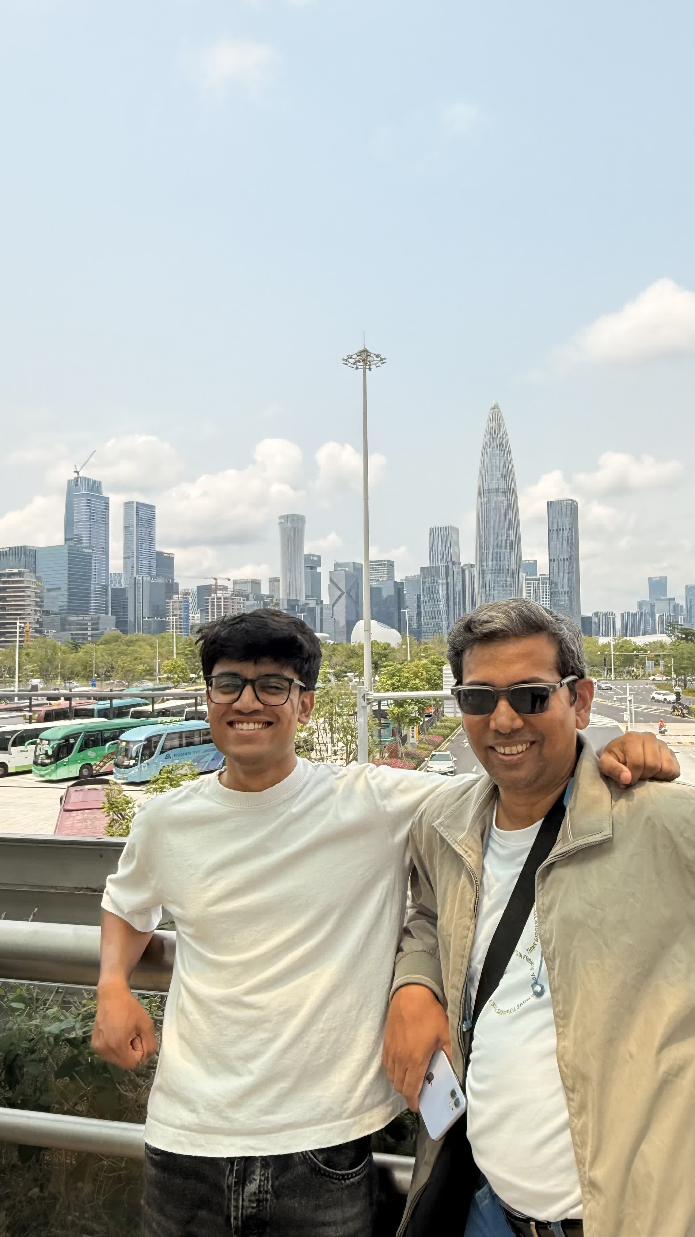 With a friend in front of the Shenzhen skyline